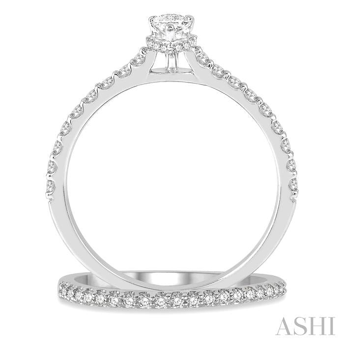 5/8 Ctw Round Cut Diamond Wedding Set With 1/2 Ct Pear Cut 1/4 Ct Center Stone Engagement Ring and 1/6 Ct Wedding Band i