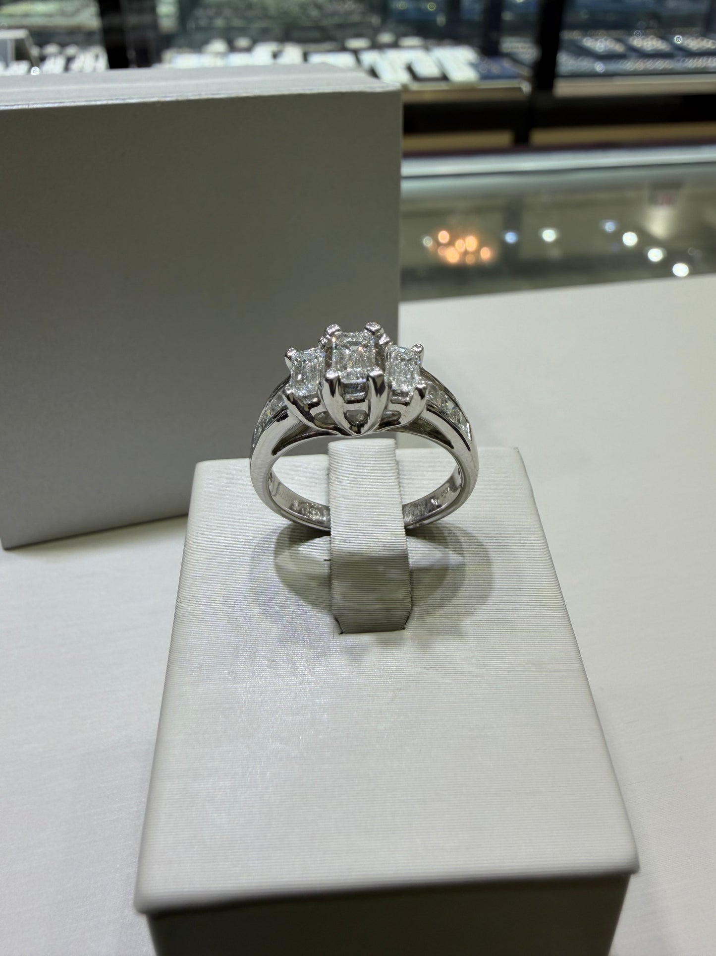 1.49 CTW Certified Emerald-Cut Three-Stone Diamond Ring with Princess-Cut Accents | Monica Jewelers