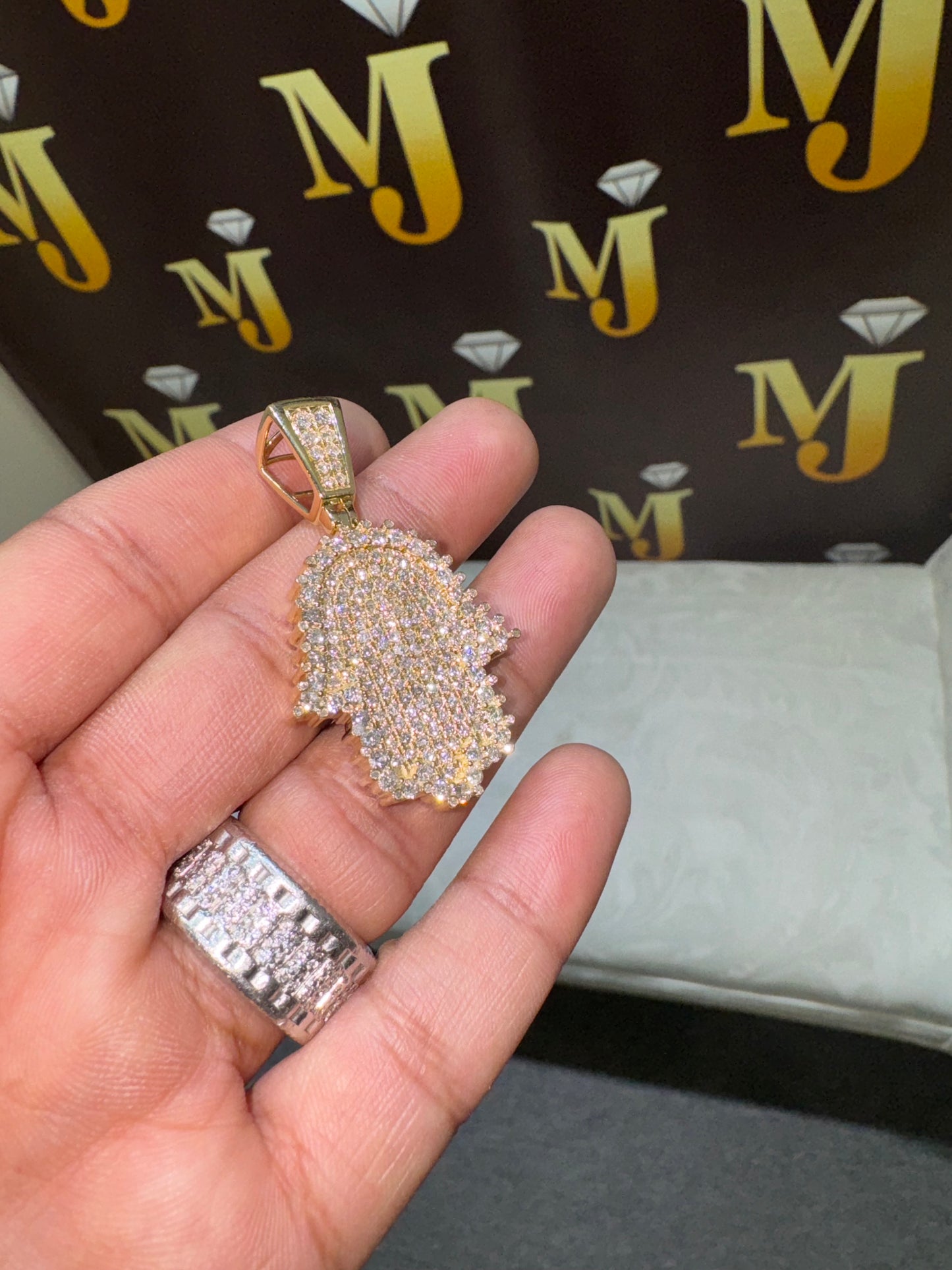 14k yellow Gold and diamond Hamsa pendant with chain