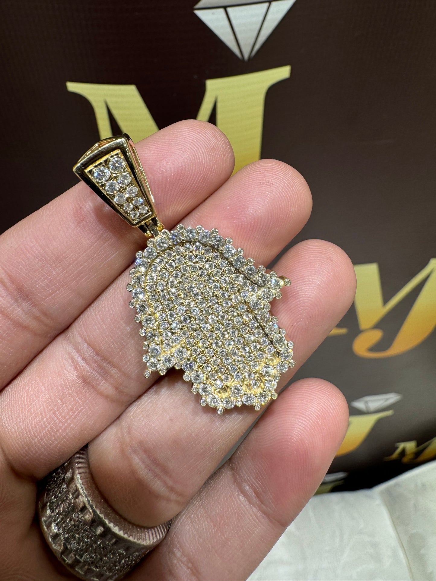 14k yellow Gold and diamond Hamsa pendant with chain