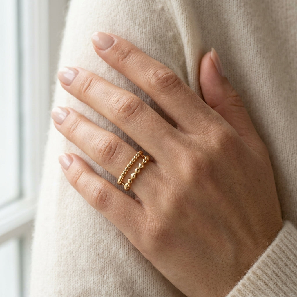 Gabriel & Co. 14K Yellow Plain Gold Bujukan Pyramid Easy Stackable Ring - worn lifestyle photo