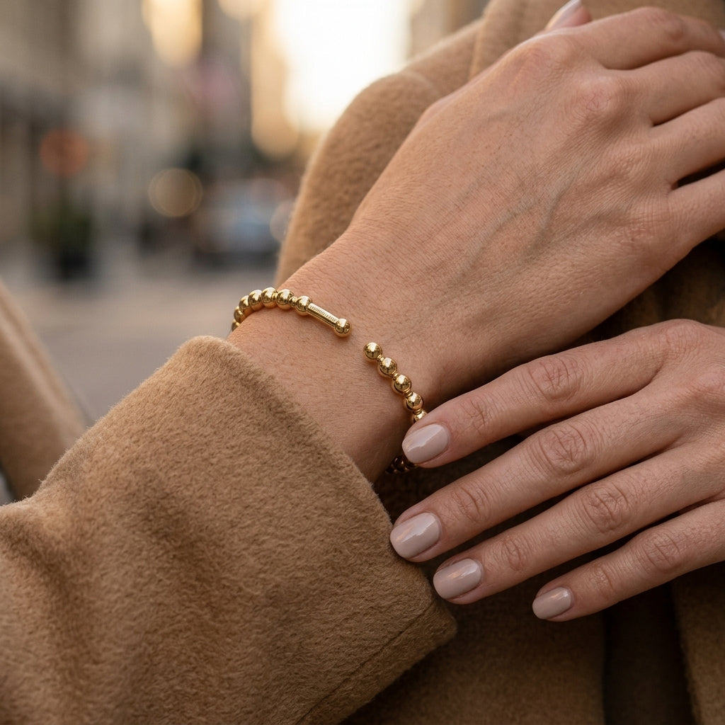 Gabriel & Co. 14K Yellow Gold Bujukan Open Bangle SZ 6.25 - worn lifestyle photo
