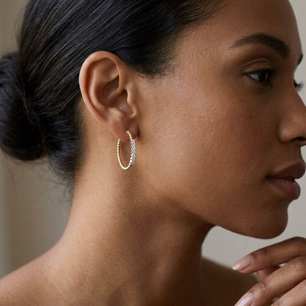 Gabriel & Co. 14K Yellow Gold 30mm Bujukan Diamond Classic Hoop Earrings 1/3CTW - worn lifestyle photo