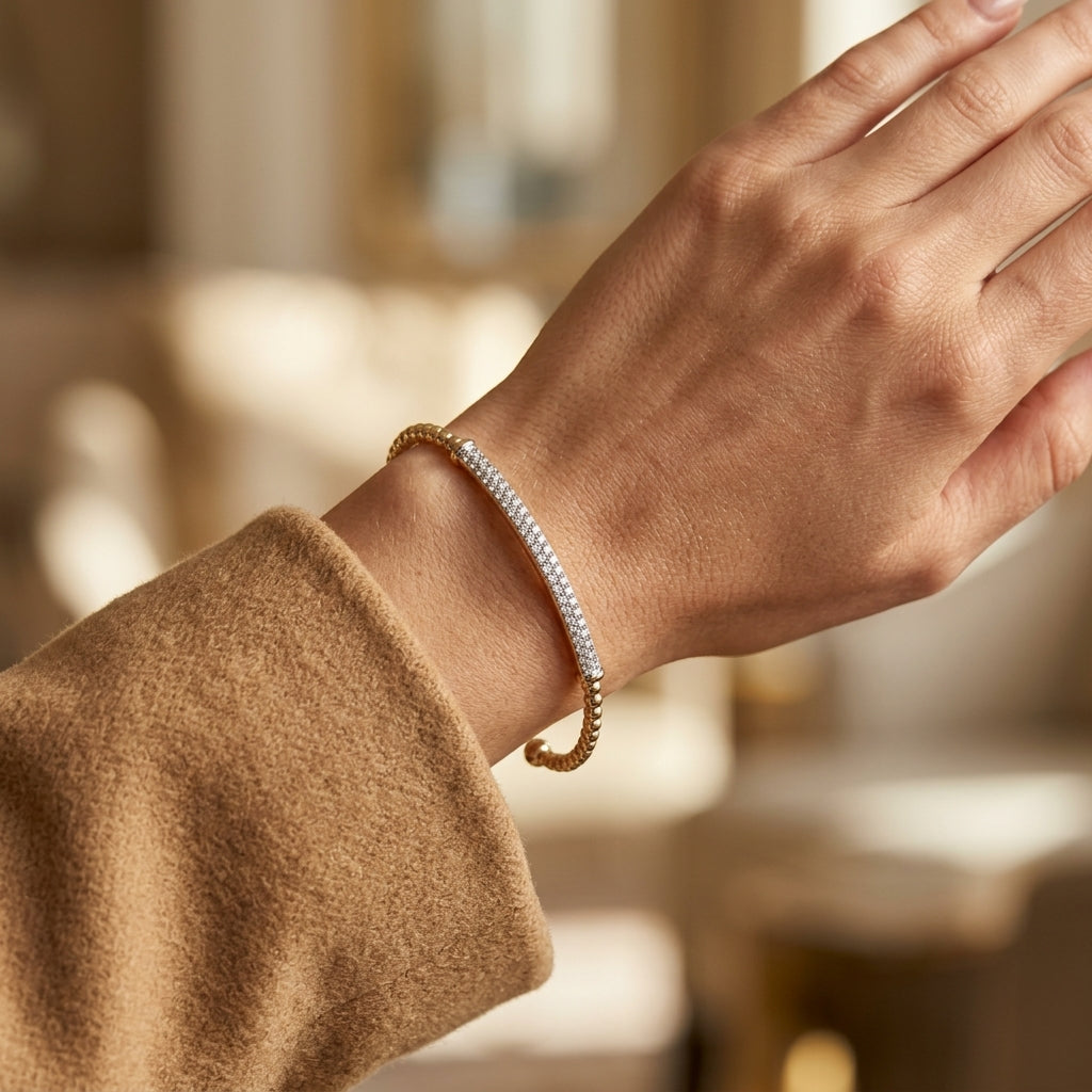 Gabriel & Co. 14K Yellow Gold Bujukan Diamond Bar Split Bangle SZ6.25 .34CTW - worn lifestyle photo