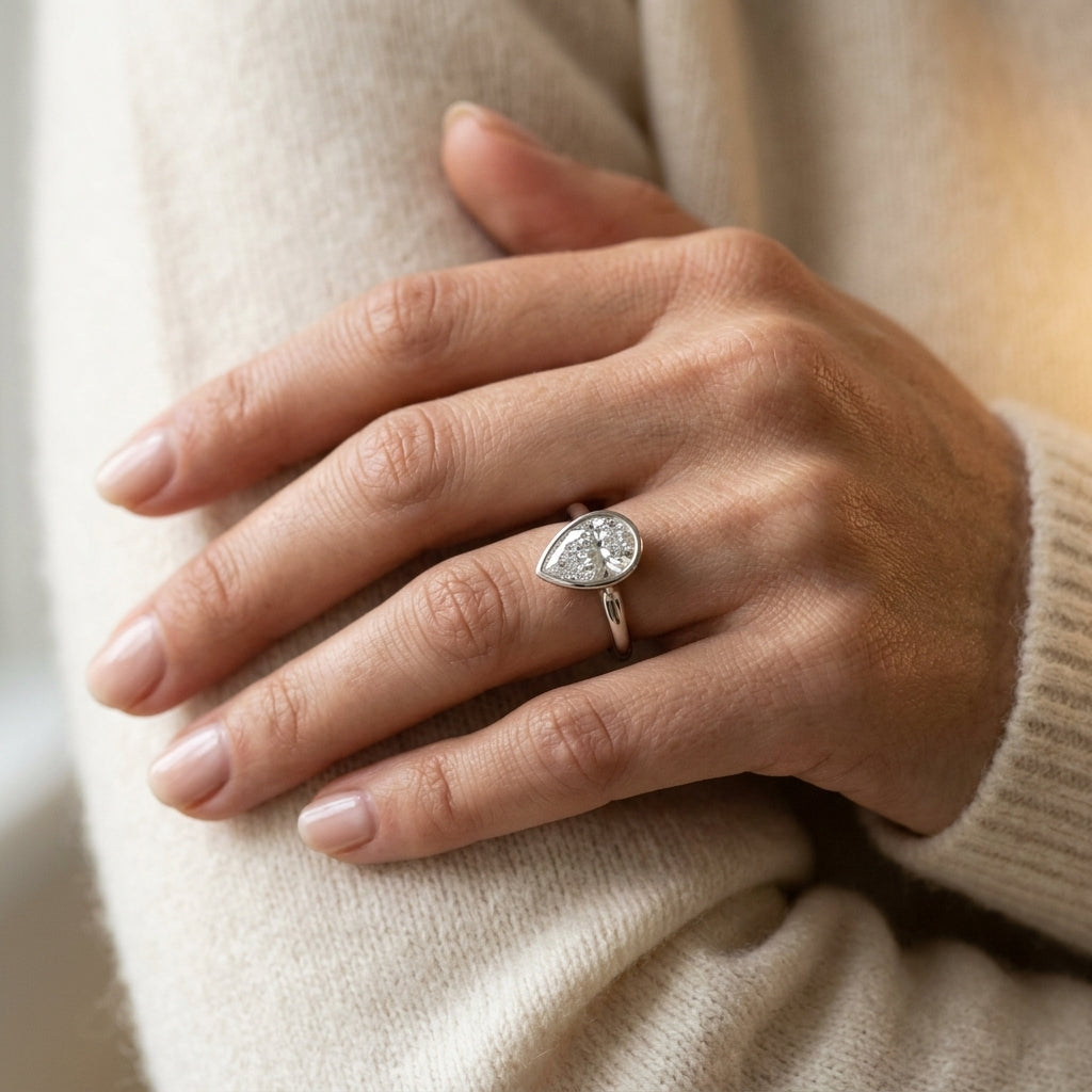 Bezel Set Pear Solitaire Engagement Ring - worn lifestyle photo