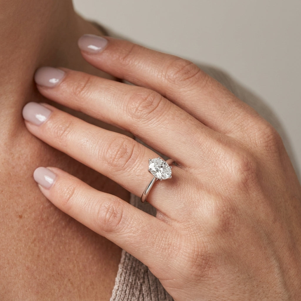 Solitaire Oval Engagement Ring - worn lifestyle photo