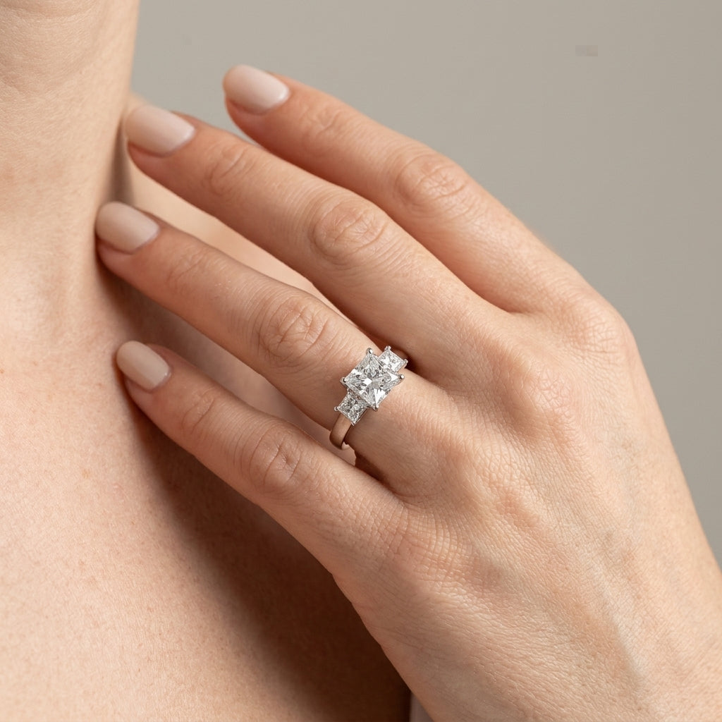 ENGAGEMENT RINGS 3 STONE PRINCESS - worn lifestyle photo