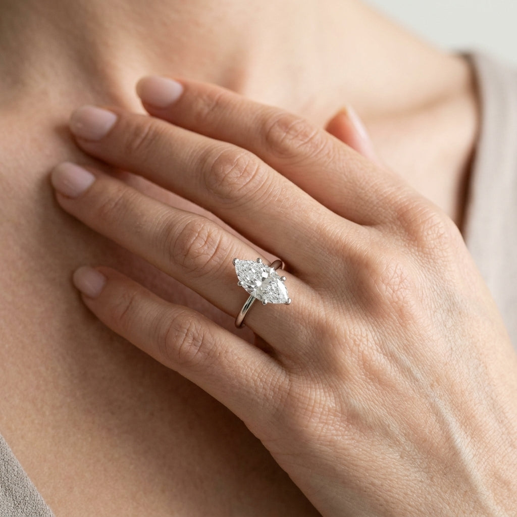 Hidden Halo Marquise Engagement Ring - worn lifestyle photo