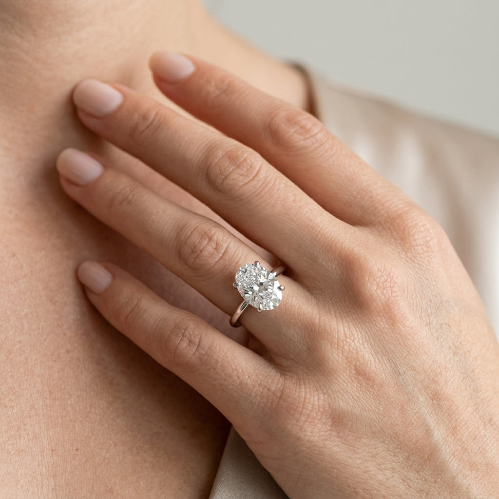 6-Prong Oval Solitaire Engagement Ring - worn lifestyle photo