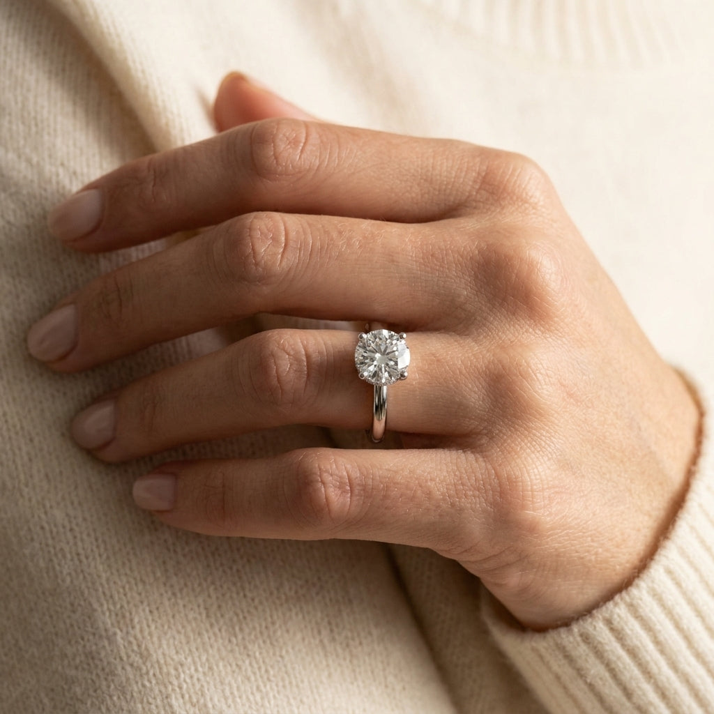 Contemporary Solitaire Engagement Ring - worn lifestyle photo