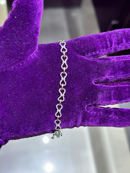 10k rose gold .58ctw infinity diamond bracelet