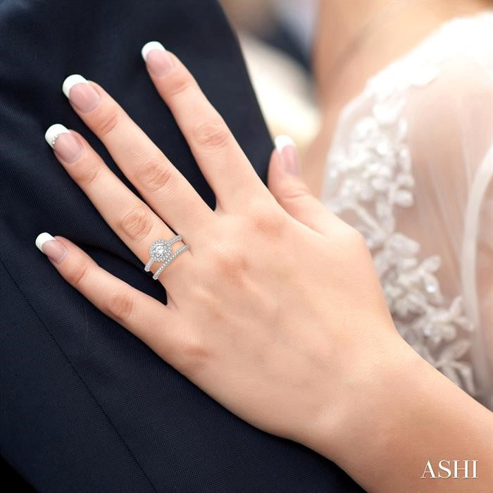 7/8 Ctw Round Cut Diamond Wedding Set With 3/4 Ctw Round Cut Engagement Ring and 1/6 Ctw Wedding Band in 14K White Gold