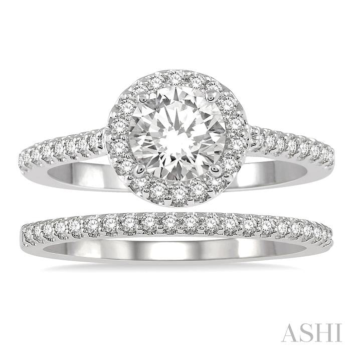 7/8 Ctw Round Cut Diamond Wedding Set With 3/4 Ctw Round Cut Engagement Ring and 1/6 Ctw Wedding Band in 14K White Gold