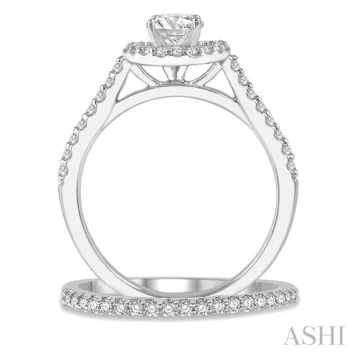 7/8 Ctw Round Cut Diamond Wedding Set With 3/4 Ctw Round Cut Engagement Ring and 1/6 Ctw Wedding Band in 14K White Gold