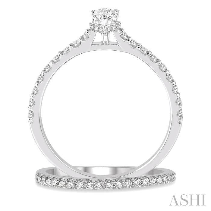 3/4 Ctw Diamond Wedding Set With 5/8 Ct Pear Cut Diamond Engagement Ring and 1/6 Ct Wedding Band in 14K White Gold