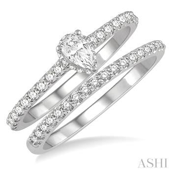 5/8 Ctw Round Cut Diamond Wedding Set With 1/2 Ct Pear Cut 1/4 Ct Center Stone Engagement Ring and 1/6 Ct Wedding Band in 14K White Gold