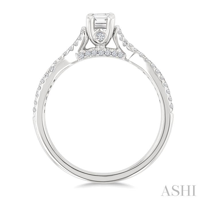 1/2 Ctw Criss Cross Shank Round Cut Diamond Engagement Ring With 1/3 Ct Emerald Cut Diamond Center Stone in 14K White Go