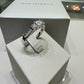 14K White Gold Three-Stone Diamond Engagement Ring with Peekaboo Diamonds – 0.75 CTW