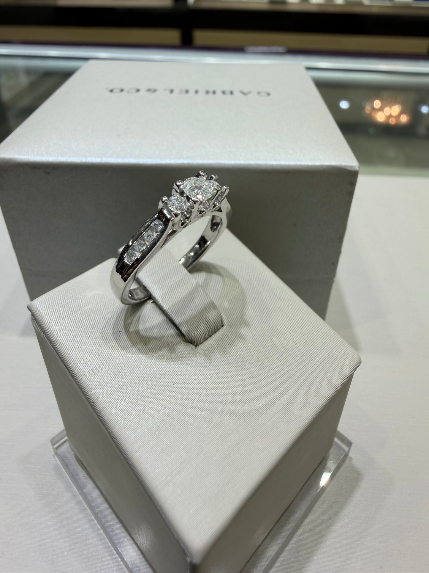 14K White Gold Three-Stone Diamond Engagement Ring with Peekaboo Diamonds – 0.75 CTW