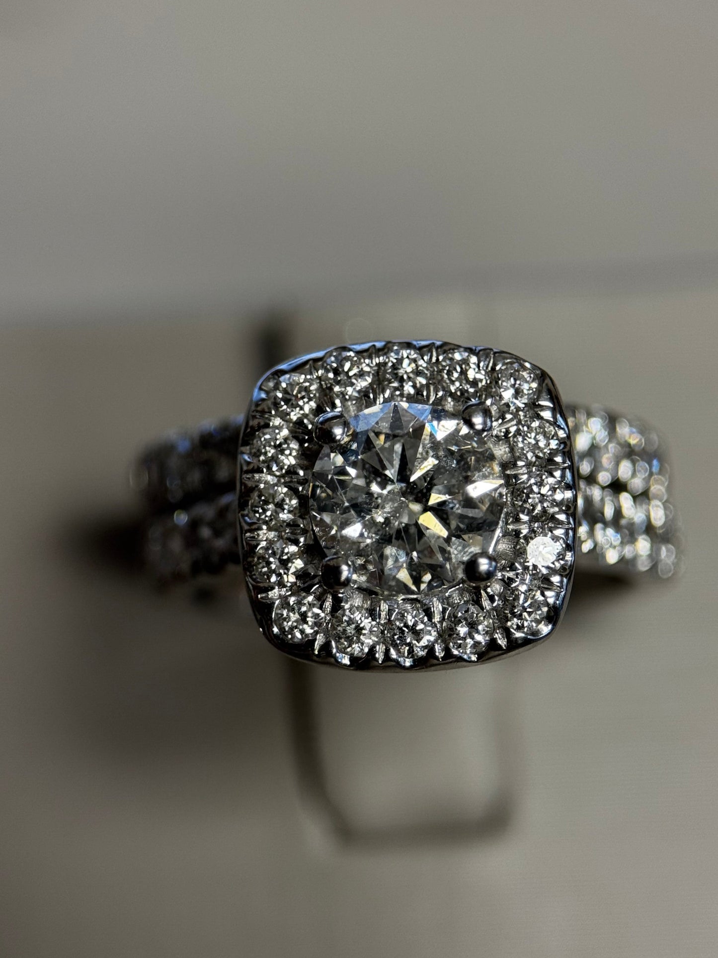 14K white gold halo wedding set with 1ct round diamond. Brilliant halo & matching band for timeless sparkle and elegance