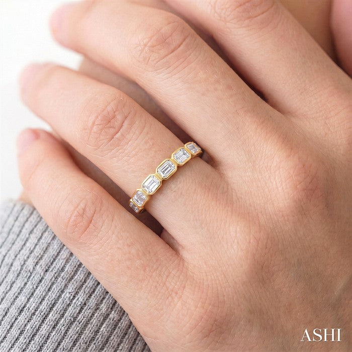 3/4 Ctw East-West Emerald Cut Bezel Diamond Fashion Band in 14K Yellow Gold