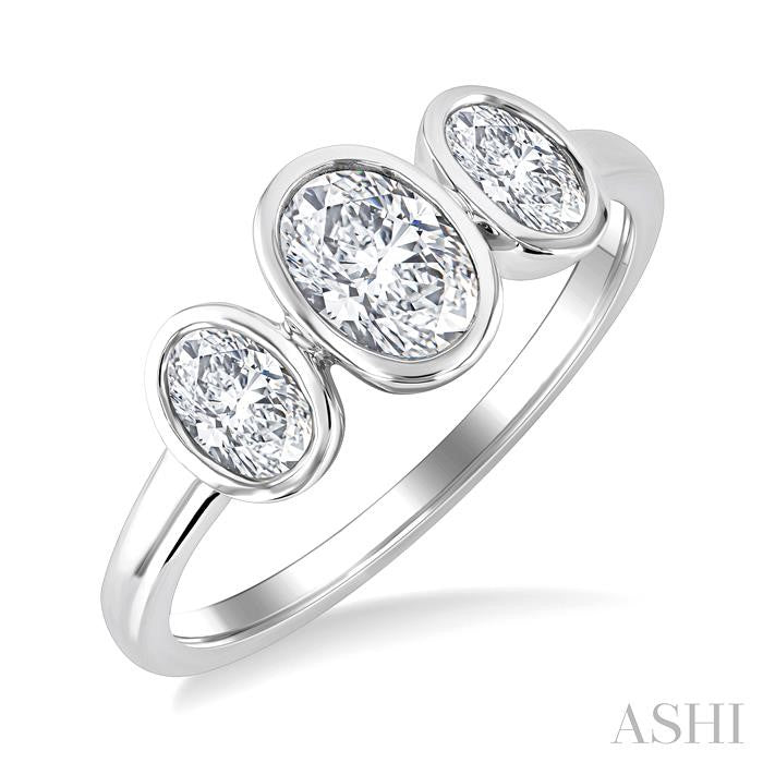 1 Ctw 3-Stone Bezel Set Oval Cut Diamond Ring in 14K White Gold