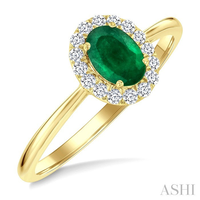 6X4 MM Oval Shape Emerald and 1/6 Ctw Round Cut Diamond Halo Precious Ring in 14K Yellow Gold