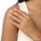 5X3 MM Oval Shape Blue Topaz and 1/20 Ctw Round Cut Diamond Halo Semi-Precious Ring in 10K White Gold
