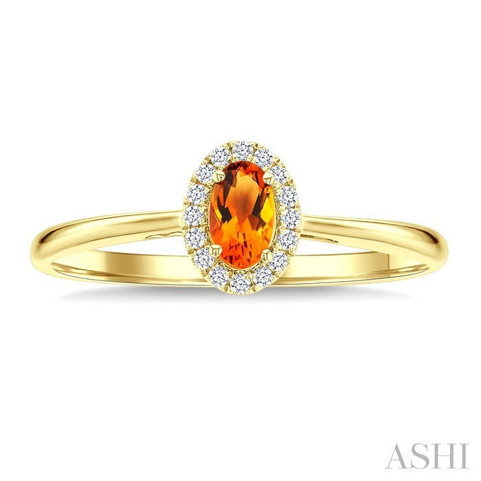 5X3 MM Oval Shape Citrine and 1/20 Ctw Round Cut Diamond Halo Semi-Precious Ring in 10K Yellow Gold