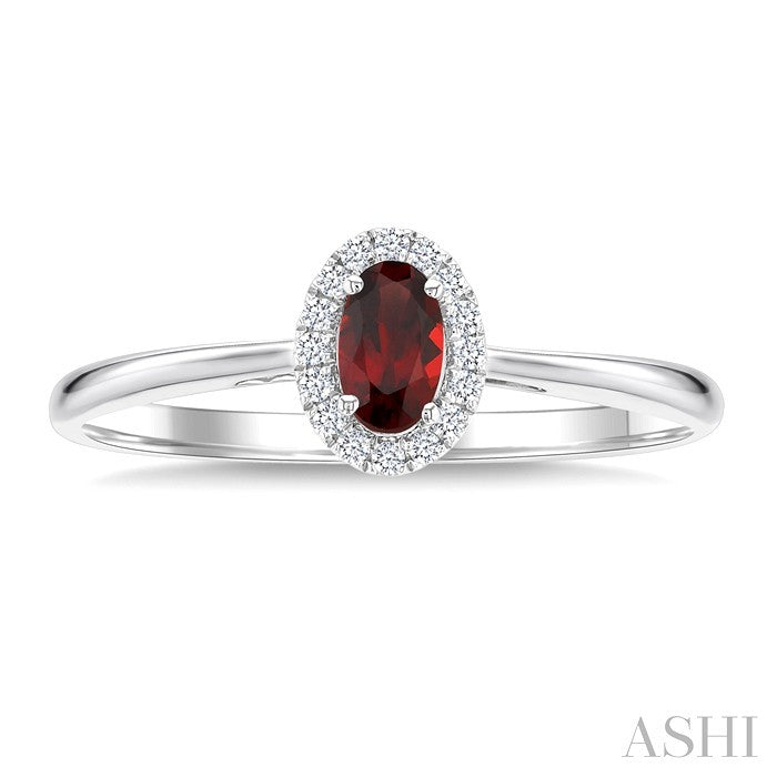 5X3 MM Oval Shape Garnet and 1/20 Ctw Round Cut Diamond Halo Semi-Precious Ring in 10K White Gold