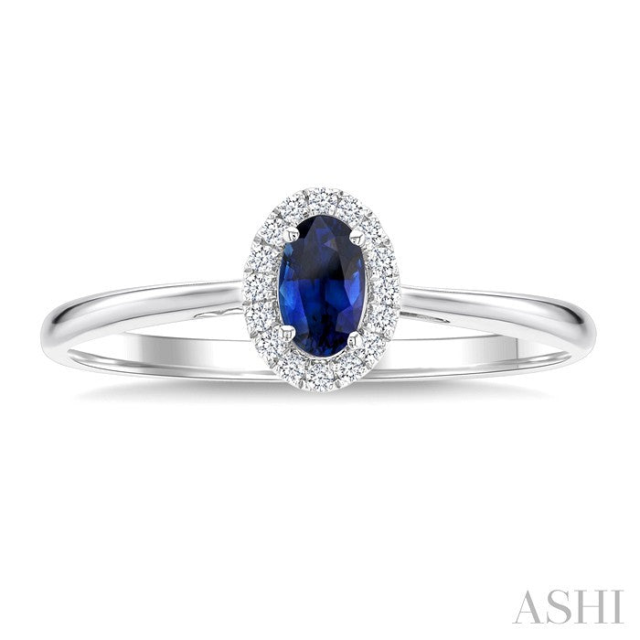 5X3 MM Oval Shape Sapphire and 1/20 Ctw Round Cut Diamond Halo Precious Ring in 10K White Gold