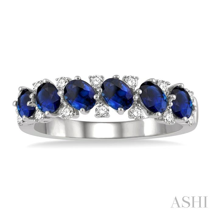 4X3 MM Oval Shape Sapphire and 1/5 Ctw Round Cut Diamond Precious Band in 14K White Gold