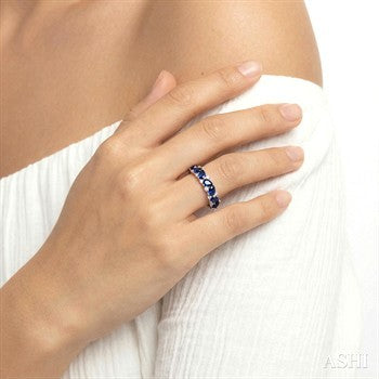 4X3 MM Pear Shape Sapphire and 1/6 Ctw Round Cut Diamond Precious Band in 14K White Gold