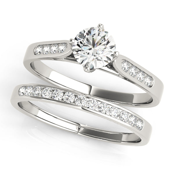 Single Row Channel Set Peg Head Engagement Ring