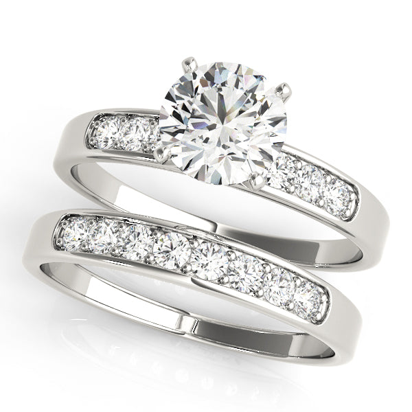 Single Row Channel Set Peg Head Engagement Ring