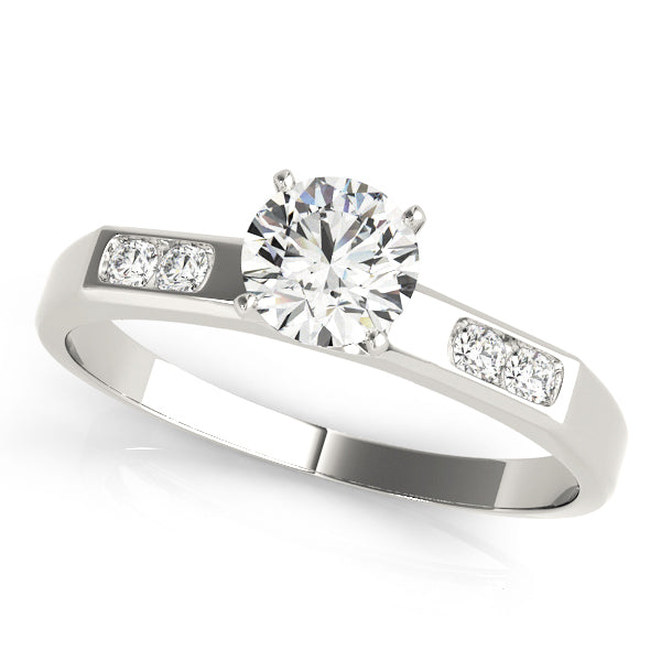 Single Row Channel Set Peg Head Engagement Ring