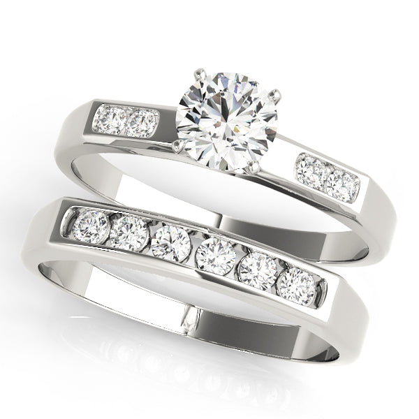 Single Row Channel Set Peg Head Engagement Ring