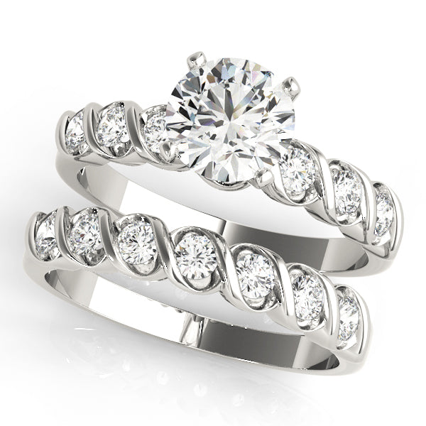 Single Row Peg Head Engagement Ring