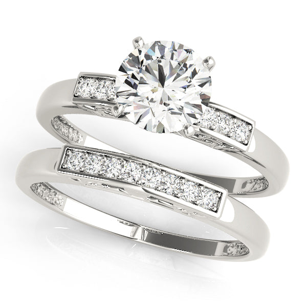Single Row Peg Head Engagement Ring