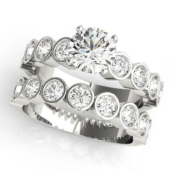 ENGAGEMENT RINGS SINGLE ROW BEZEL