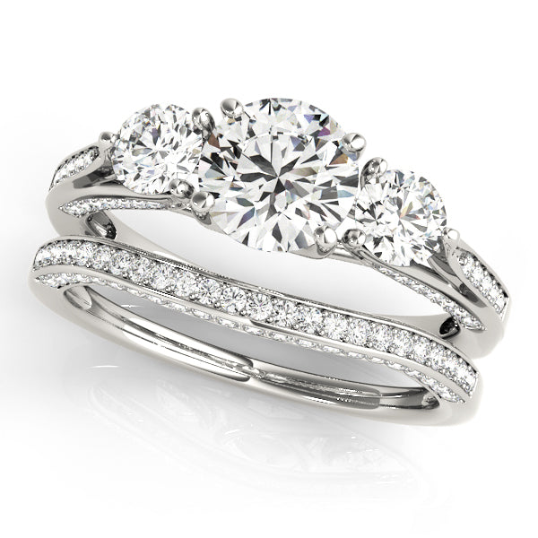 ENGAGEMENT RINGS 3 STONE ROUND