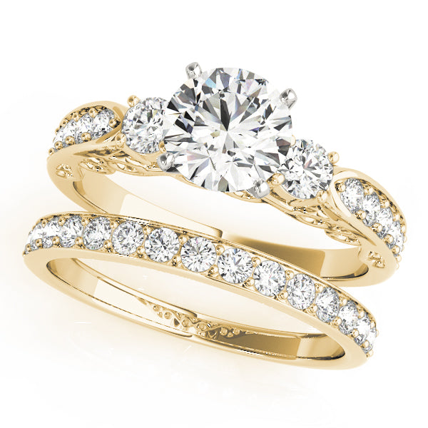 ENGAGEMENT RINGS 3 STONE ROUND