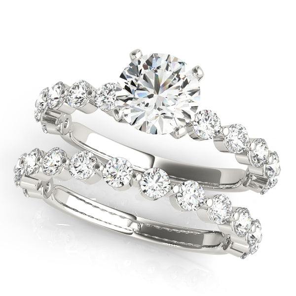 Single Shared Prong Engagement Ring
