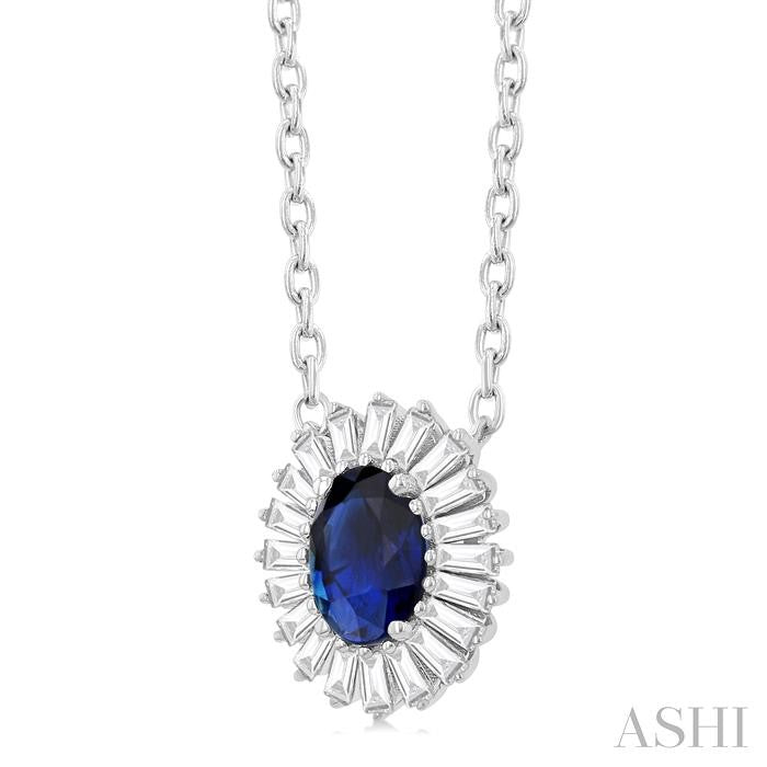 1/3 Ctw Oval Cut 6X4 MM Sapphire and Baguette Cut Diamond Halo Precious Pendant With Chain in 14K White Gold