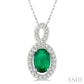 6X4 MM Oval Cut Emerald and 1/10 Ctw Round Cut Diamond Pendant in 10K White Gold with Chain