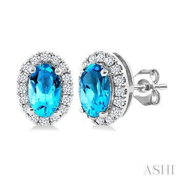 5X3 MM Oval Shape Blue Topaz and 1/8 Ctw Round Cut Diamond Halo Semi-Precious Stud Earrings in 10K White Gold