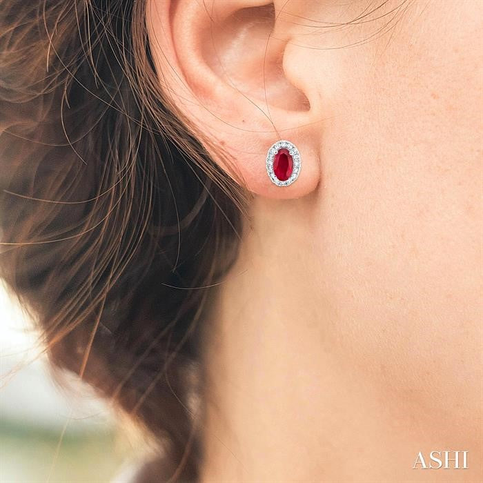 5X3 MM Oval Shape Ruby and 1/8 Ctw Round Cut Diamond Halo Precious Stud Earrings in 10K White Gold