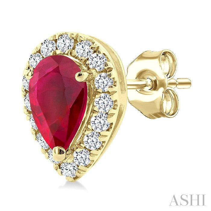 5X3 MM Pear Shape Ruby and 1/8 Ctw Round Cut Diamond Halo Precious Stud Earrings in 10K Yellow Gold