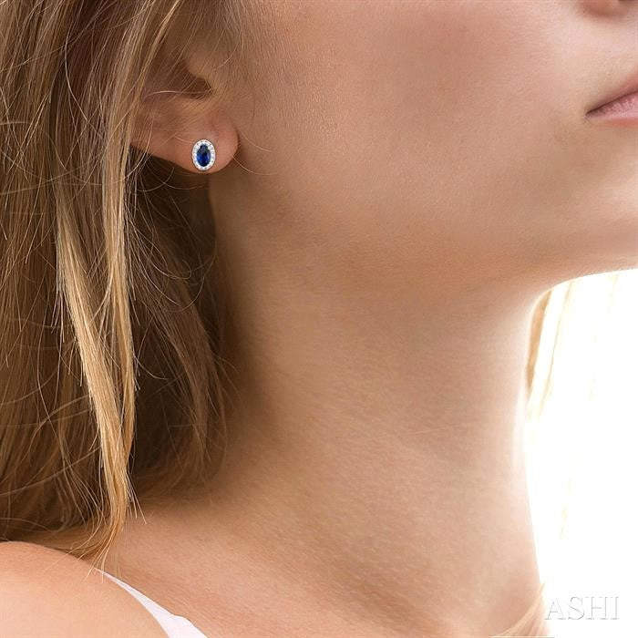 5X3 MM Oval Shape Sapphire and 1/8 Ctw Round Cut Diamond Halo Precious Stud Earrings in 10K White Gold