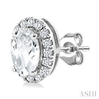 5X3 MM Oval Shape White Topaz and 1/8 Ctw Round Cut Diamond Halo Semi-Precious Stud Earrings in 10K White Gold